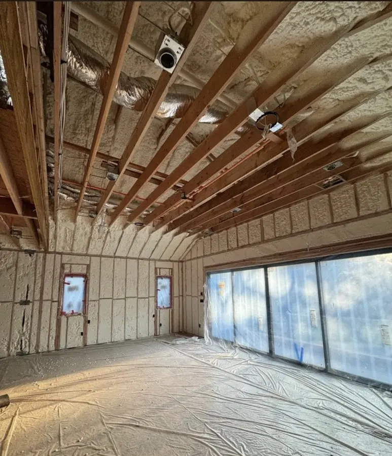 Interior walls and ceiling insulated with spray foam during new construction in New Whiteland